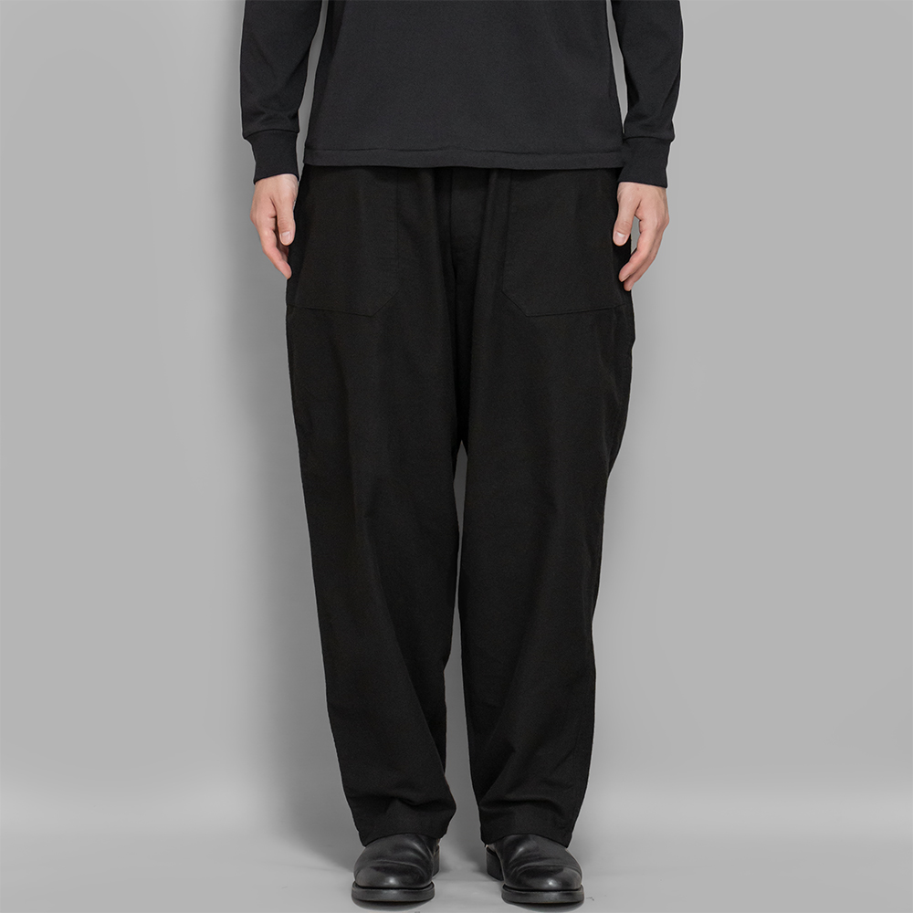 COMOLI / コットンネル テーパードパンツ